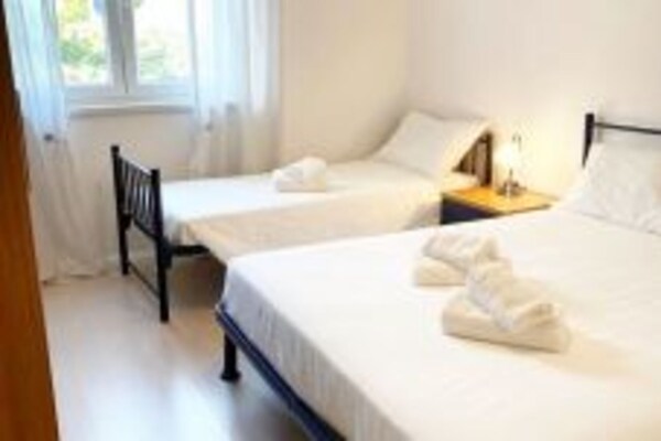 Foto van Mooi appartement met uitzicht - Vakantiehuis in Funtana - BedRoom