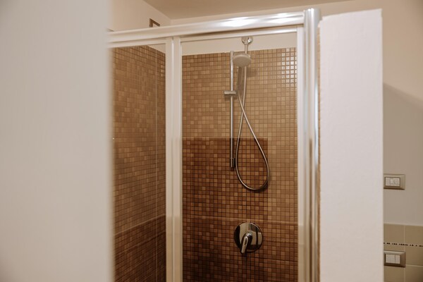 Foto van Nautic Resort San Carlo met uitzicht op het meer - Vakantiehuis in Gargnano - BathRoom