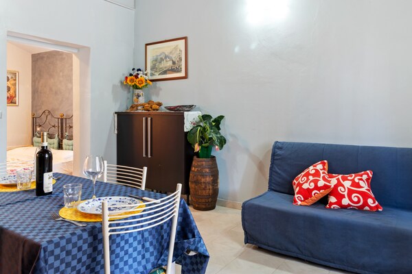 Foto van Landelijk huis in Arezzo met zwembad - Vakantiehuis in Tregozzano, Arezzo - LivingRoom