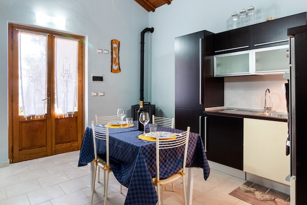 Foto van Landelijk huis in Arezzo met zwembad - Vakantiehuis in Tregozzano, Arezzo - DiningRoom