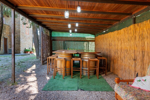 Foto van Landelijk huis in Arezzo met zwembad - Vakantiehuis in Tregozzano, Arezzo - TerraceBalcony
