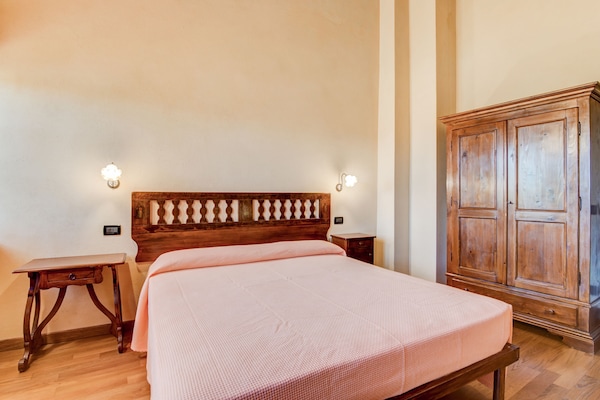 Foto van Vakantiehuis in Urbania met Heuvelzicht - Vakantiehuis in Urbania - BedRoom