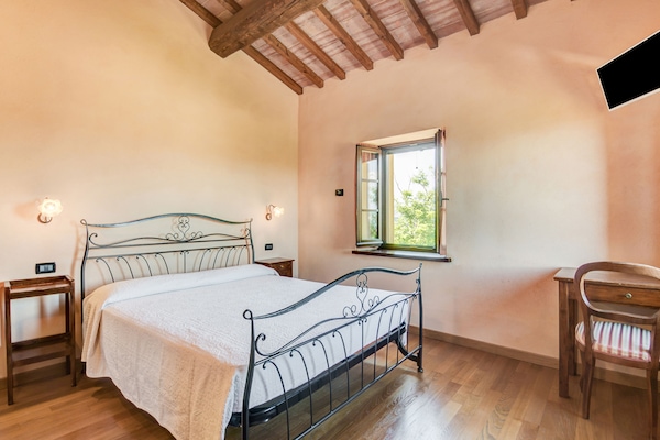 Foto van Vakantiehuis in Urbania met Heuvelzicht - Vakantiehuis in Urbania - BedRoom