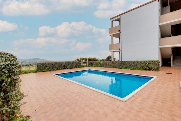 Foto van Zwembad condivisa en giardino privato - Vakantiehuis in Badesi - PoolOfHouse