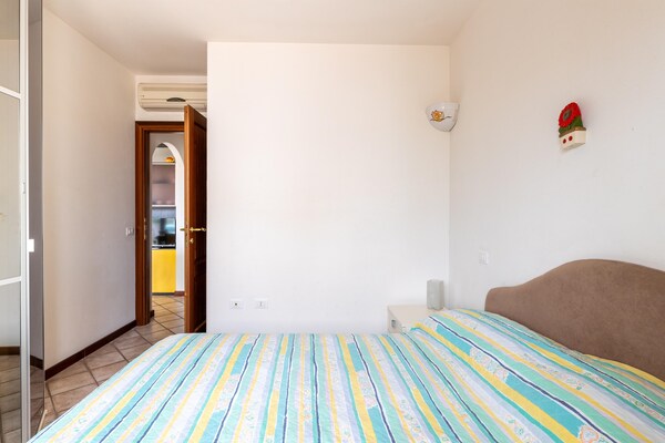 Foto van Appartamento con giardino, een merrie 300 meter - Vakantiehuis in Lu Bagnu - BedRoom