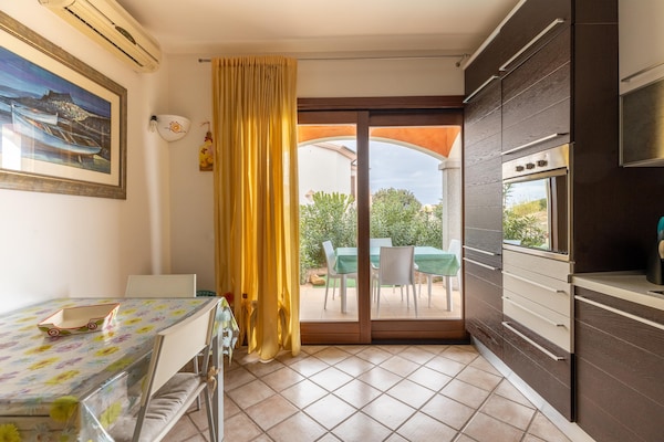 Foto van Appartamento con giardino, een merrie 300 meter - Vakantiehuis in Lu Bagnu - LivingRoom