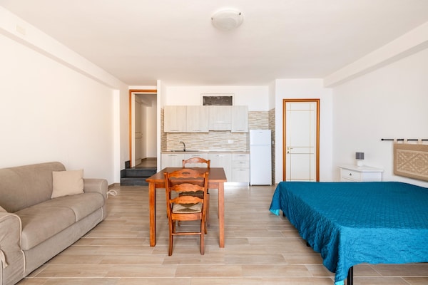 Foto van Aria condizionata en terrazza vista merrie - Vakantiehuis in Castelsardo - LivingRoom