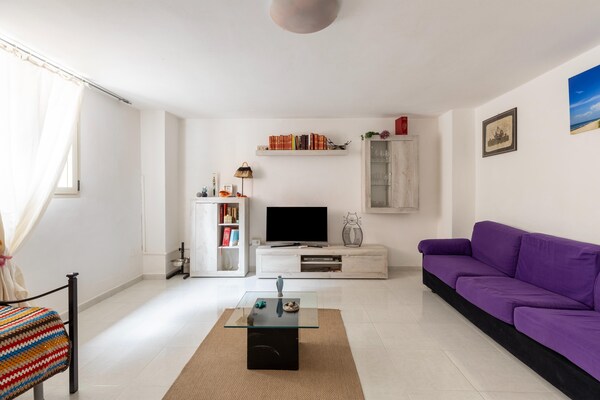 Foto van Su due livelli, con aria condizionata - Vakantiehuis in Castelsardo - LivingRoom