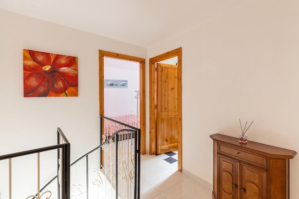 Foto van Su due livelli, con aria condizionata - Vakantiehuis in Castelsardo - Landing