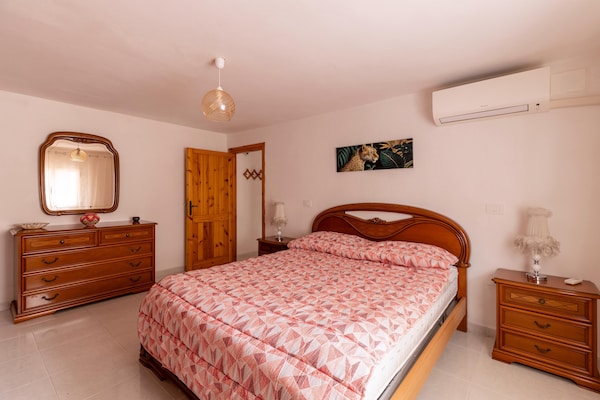 Foto van Su due livelli, con aria condizionata - Vakantiehuis in Castelsardo - BedRoom