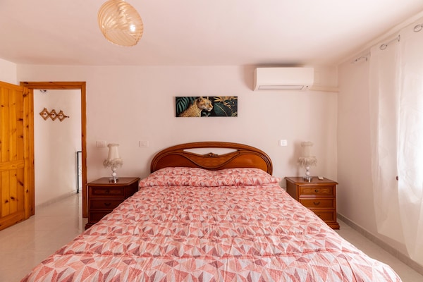 Foto van Su due livelli, con aria condizionata - Vakantiehuis in Castelsardo - BedRoom