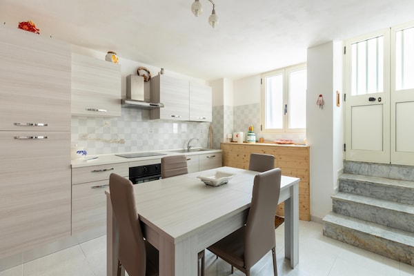 Foto van Su due livelli, con aria condizionata - Vakantiehuis in Castelsardo - Kitchen