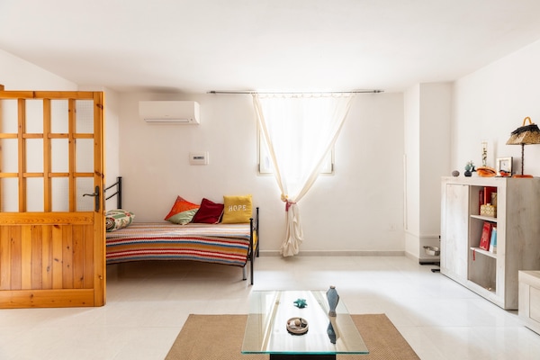 Foto van Su due livelli, con aria condizionata - Vakantiehuis in Castelsardo - LivingRoom