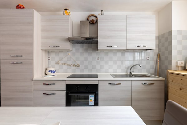 Foto van Su due livelli, con aria condizionata - Vakantiehuis in Castelsardo - Kitchen