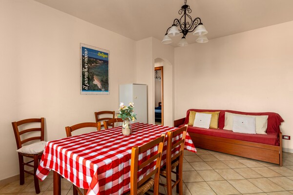 Foto van Appartamento vicino al mare, 2 zwembaden - Vakantiehuis in Valledoria - LivingRoom