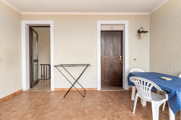 Foto van 150 meter van de zee, 2 zwembaden - Vakantiehuis in Valledoria - TerraceBalcony