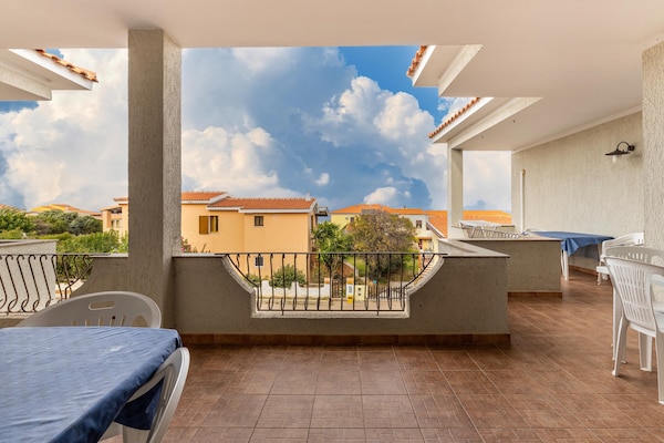Foto van 150 meter van de zee, 2 zwembaden - Vakantiehuis in Valledoria - TerraceBalcony