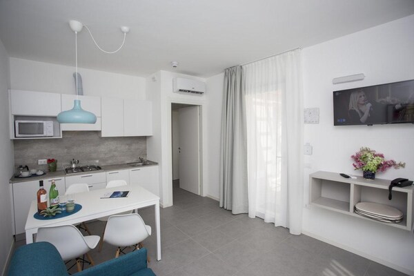 Foto van Familieappartement in Bardolino Resort - Vakantiehuis in Cisano di Bardolino - LivingRoom