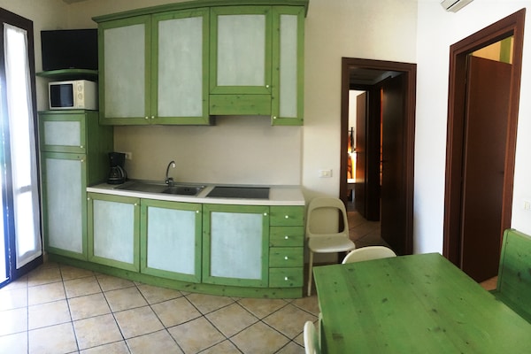Foto van Resortappartement met zwembad - Vakantiehuis in Lido di Spina - Kitchen
