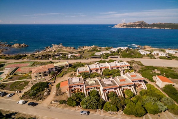 Foto van Appartement met zeezicht en een dakterras - Vakantiehuis in Santa Teresa Gallura - ExteriorSummer