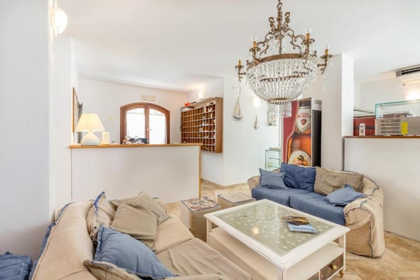 Foto van Appartement met zeezicht en een dakterras - Vakantiehuis in Santa Teresa Gallura - LivingRoom