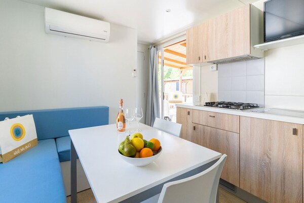 Foto van Lodge in het familiedorp Rimini vlakbij het strand - DiningRoom