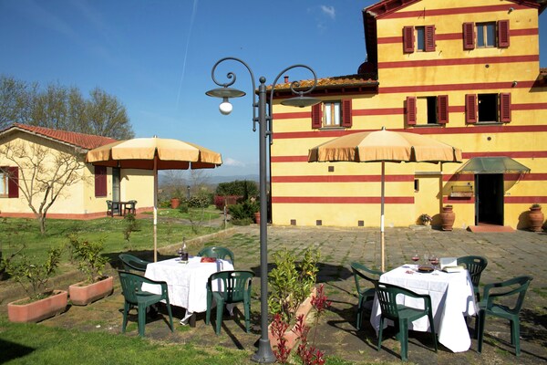 Foto van Uitje naar een Toscaans landhuis - Vakantiehuis in Pian di scò - TerraceBalcony