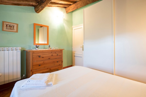 Foto van ﻿Rustiek vakantiehuis in Lucca met een privétuin - BedRoom