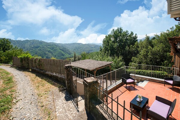 Foto van ﻿Rustiek vakantiehuis in Lucca met een privétuin - AreaSummer1KM