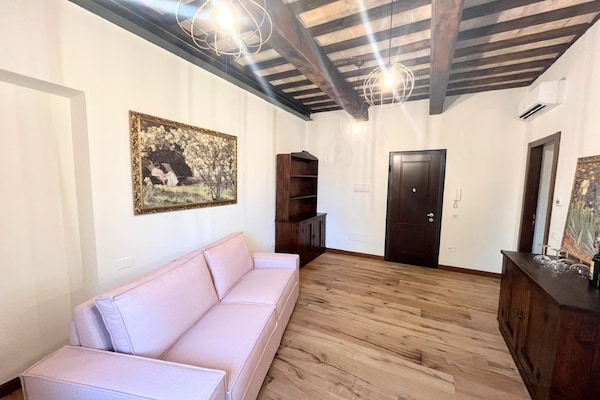 Foto van Appartement in een dorp met zwembad - Vakantiehuis in Pesaro - LivingRoom