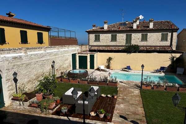 Foto van Appartement in een dorp met zwembad - Vakantiehuis in Pesaro - GardenSummer