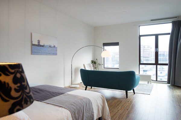 Foto van Aantrekkelijk appartement in Den Haag met balkon - Vakantiehuis in Den Haag - BedRoom