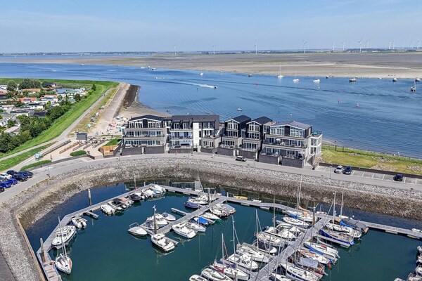 Foto van Appartement Sint Annaland met Havenzicht - Vakantiehuis in St. Annaland - ExteriorSummer