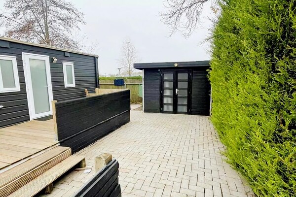 Foto van Rustig verblijf met tuin te midden van natuur nabij Alkmaar - ExteriorSummer