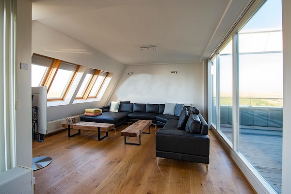 Foto van Penthouse Duinerei aan zee met sauna - Vakantiehuis in Groote Keeten - LivingRoom