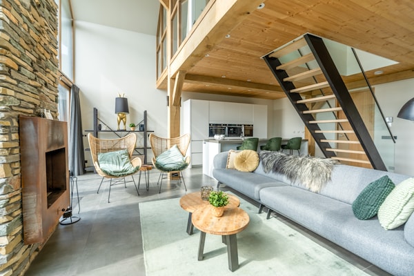 Foto van Stijlvol overnachten met hottub & sfeerhaard. - Vakantiehuis in De Koog - LivingRoom
