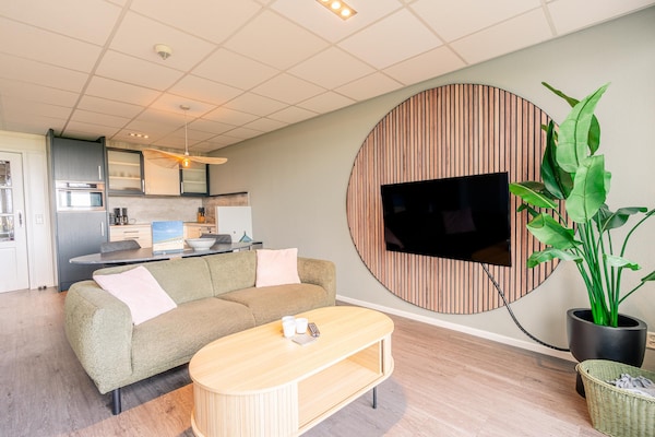 Foto van 2 persoons zeezicht appartement met sauna - Vakantiehuis in De Koog - LivingRoom