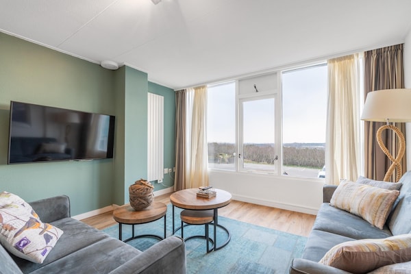 Foto van 4 Persoons appartement met eilandzicht - Vakantiehuis in De Koog - LivingRoom