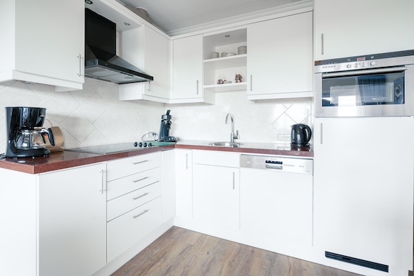 Foto van 2 Persoons appartement met eiland-zeezicht en sauna - Kitchen