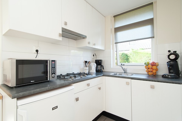 Foto van Bungalow in Zuid-Holland bij het Strand - Vakantiehuis in Noordwijk - Kitchen