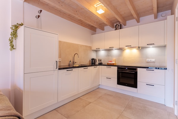 Foto van Modern vakantiehuis in Vrouwenpolder - Vakantiehuis in Vrouwenpolder - Kitchen