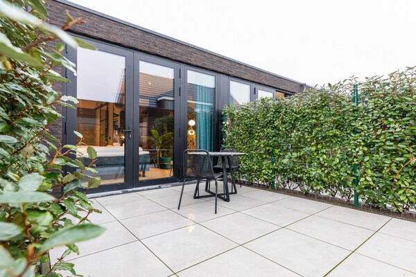 Foto van Romantisch uitje met tuin - Vakantiehuis in Koudekerke - ExteriorWinter