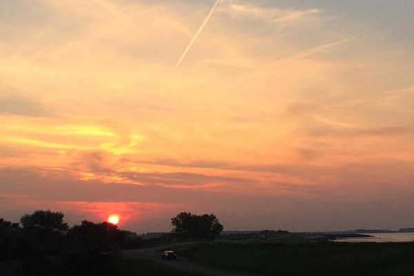 Foto van Verblijf met uitzicht op de dijk en terras - Vakantiehuis in Wemeldinge - AreaSummer20KM