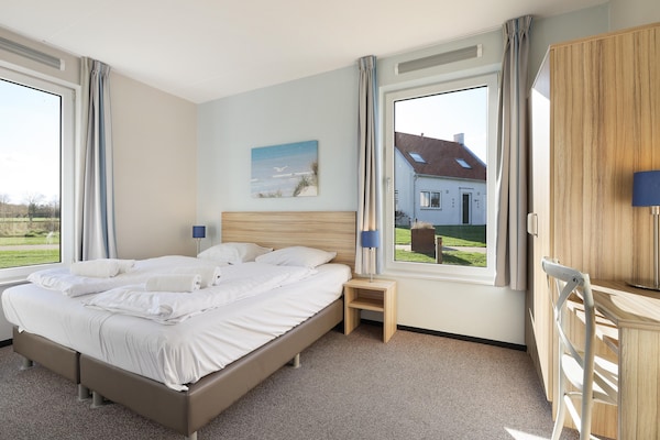 Foto van Verblijf aan het water vlakbij het strand - Vakantiehuis in Nieuwvliet - BedRoom