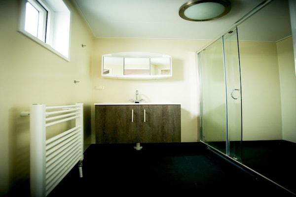 Foto van Chalet bij Loonse en Drunense Duinen - Vakantiehuis in Udenhout - BathRoom