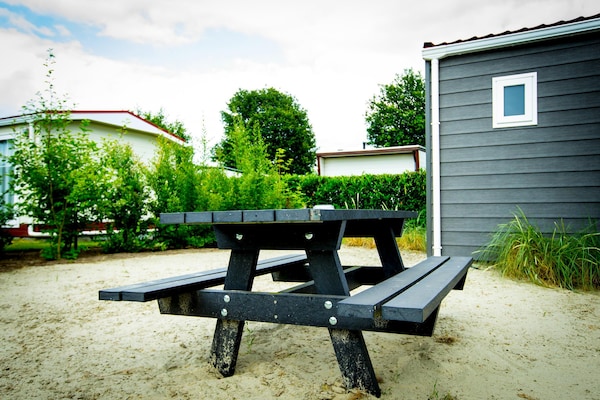 Foto van Chalet bij Loonse en Drunense Duinen - Vakantiehuis in Udenhout - TerraceBalcony