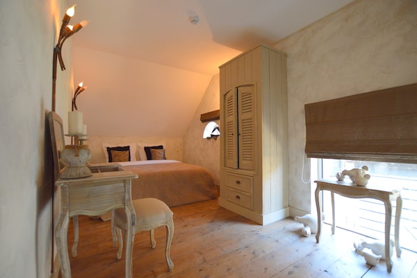 Foto van Groepsverblijf met privézwembad en sauna - Vakantiehuis in Alphen - BedRoom