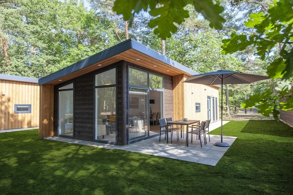 Foto van Lodge in Bospark bij natuurgebied - Vakantiehuis in Mierlo - ExteriorSummer