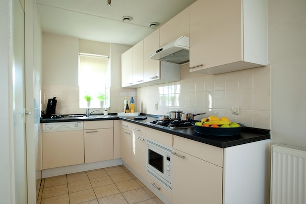 Foto van Havenwoning met fantastisch uitzicht - Vakantiehuis in Heel - Kitchen