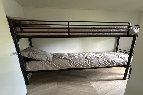 Foto van Ontsnapping in het bos Palette Resort de Steppe - Vakantiehuis in Ulicoten - BedRoom